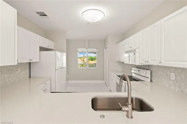 $311,000 | 7846 Regal Heron Circle, Unit 306, Naples, FL 34104