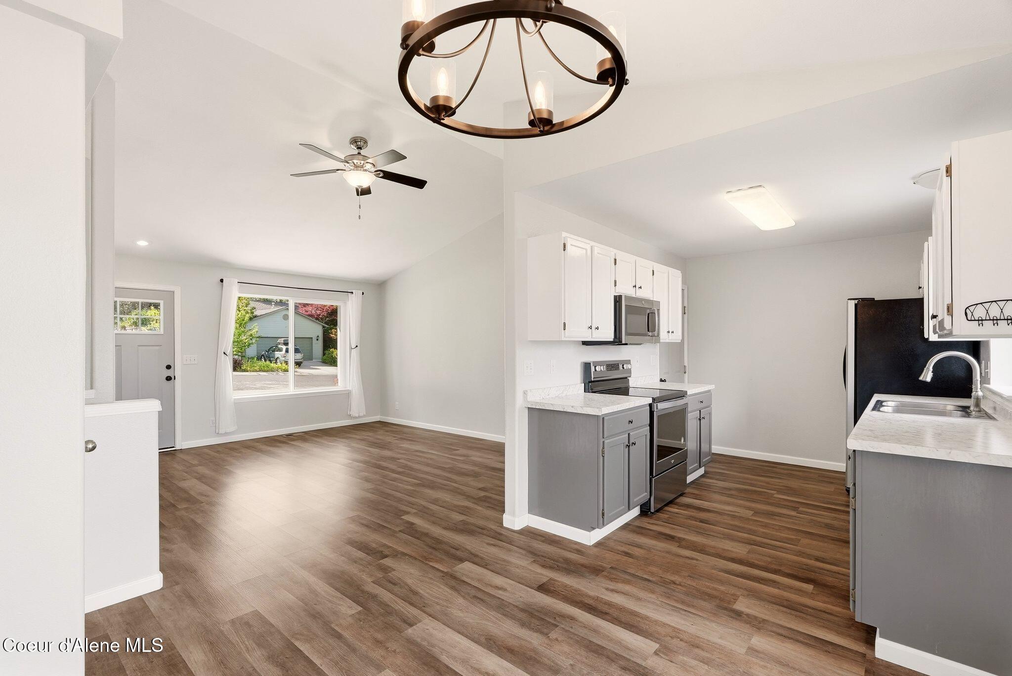 2795 North Rawhide Ridge Road Post Falls, ID 83854 - Photo 11 of 43 Dining into Kitchen