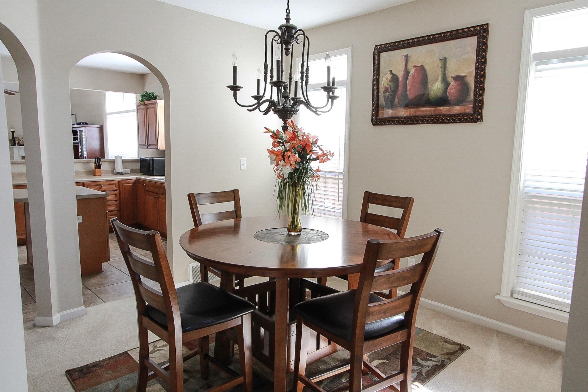 1818 North Houston Levee Road Cordova, TN 38016 - Photo 3 of 16 a view of a dining room with furniture and window