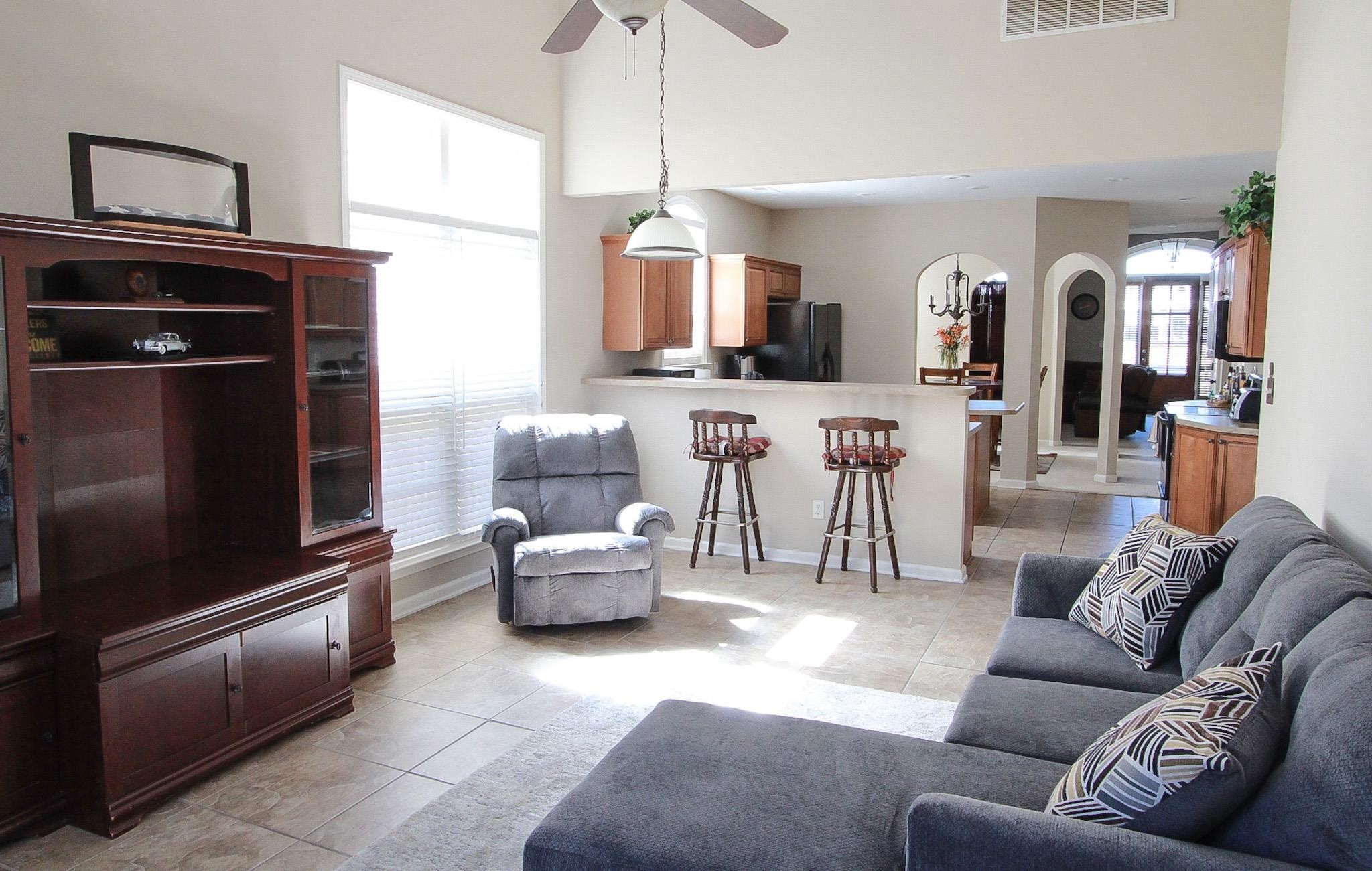1818 North Houston Levee Road Cordova, TN 38016 - Photo 6 of 16 a living room with furniture and a fireplace