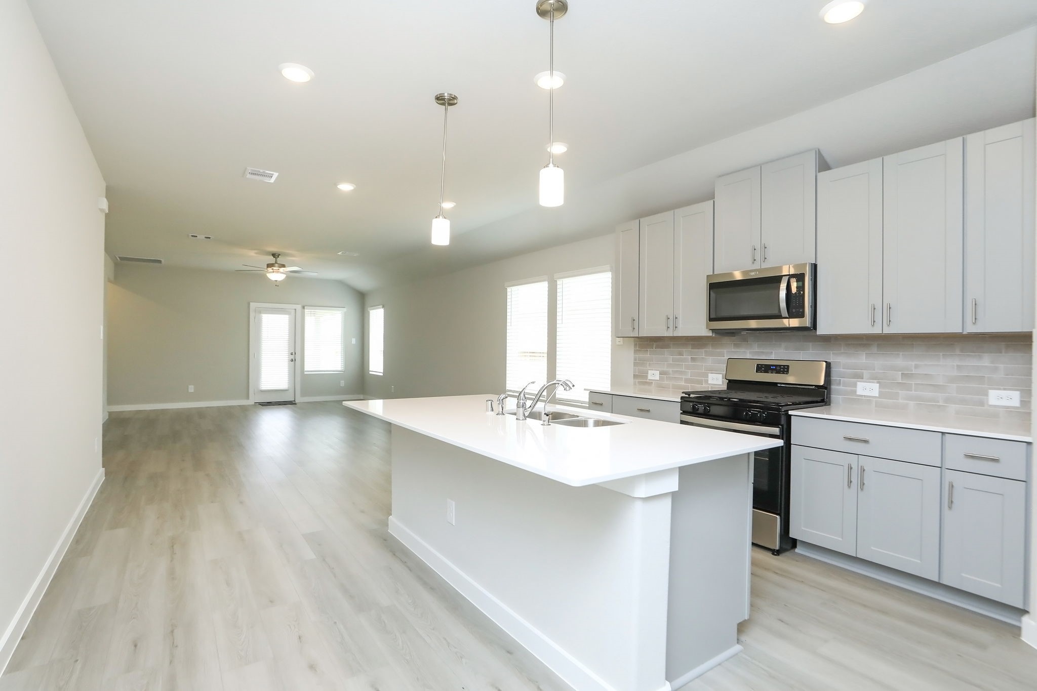 14110 Greystone Ter Street Magnolia, TX 77354 - Photo 31 of 34 The Open Floorplan Is Complimented By Tall Ceilings, Giving The Home A Welcoming, Open, And Airy Vibe.