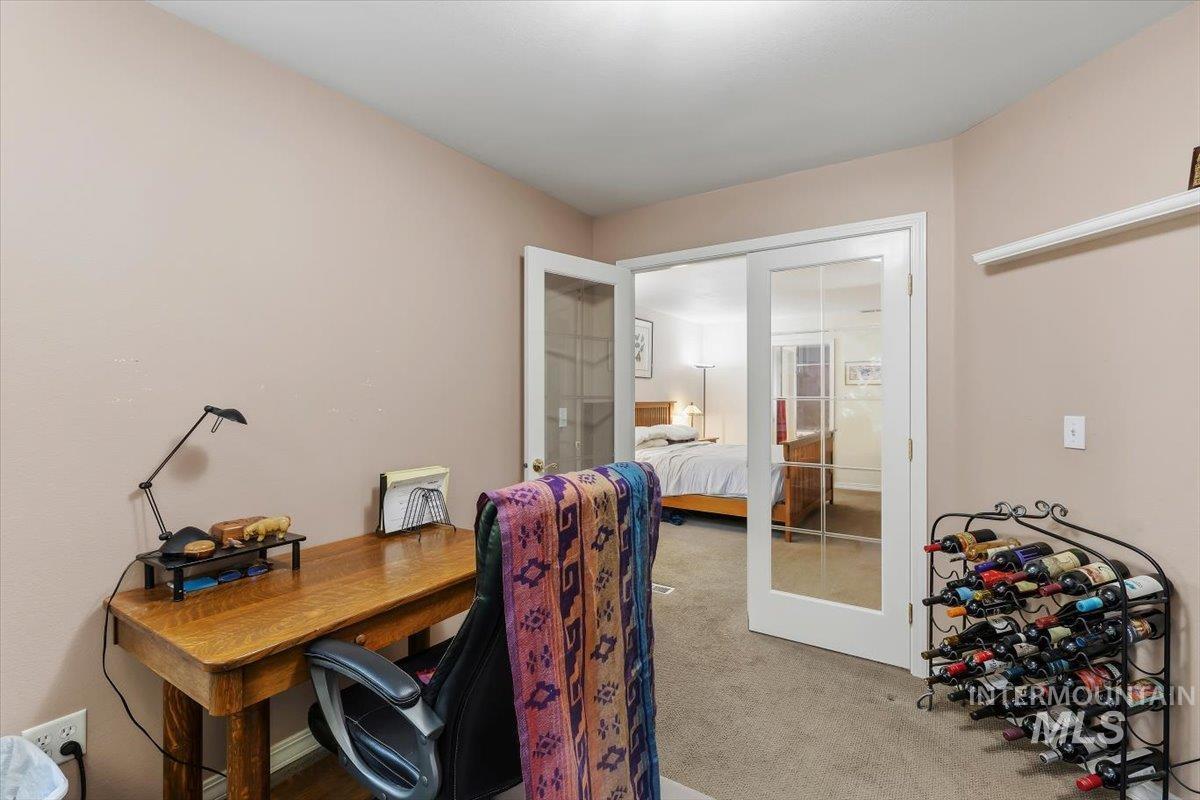 8001 West Innsbrook Court Boise, ID 83704 - Photo 23 of 39 Interior space with light-toned walls and carpet flooring