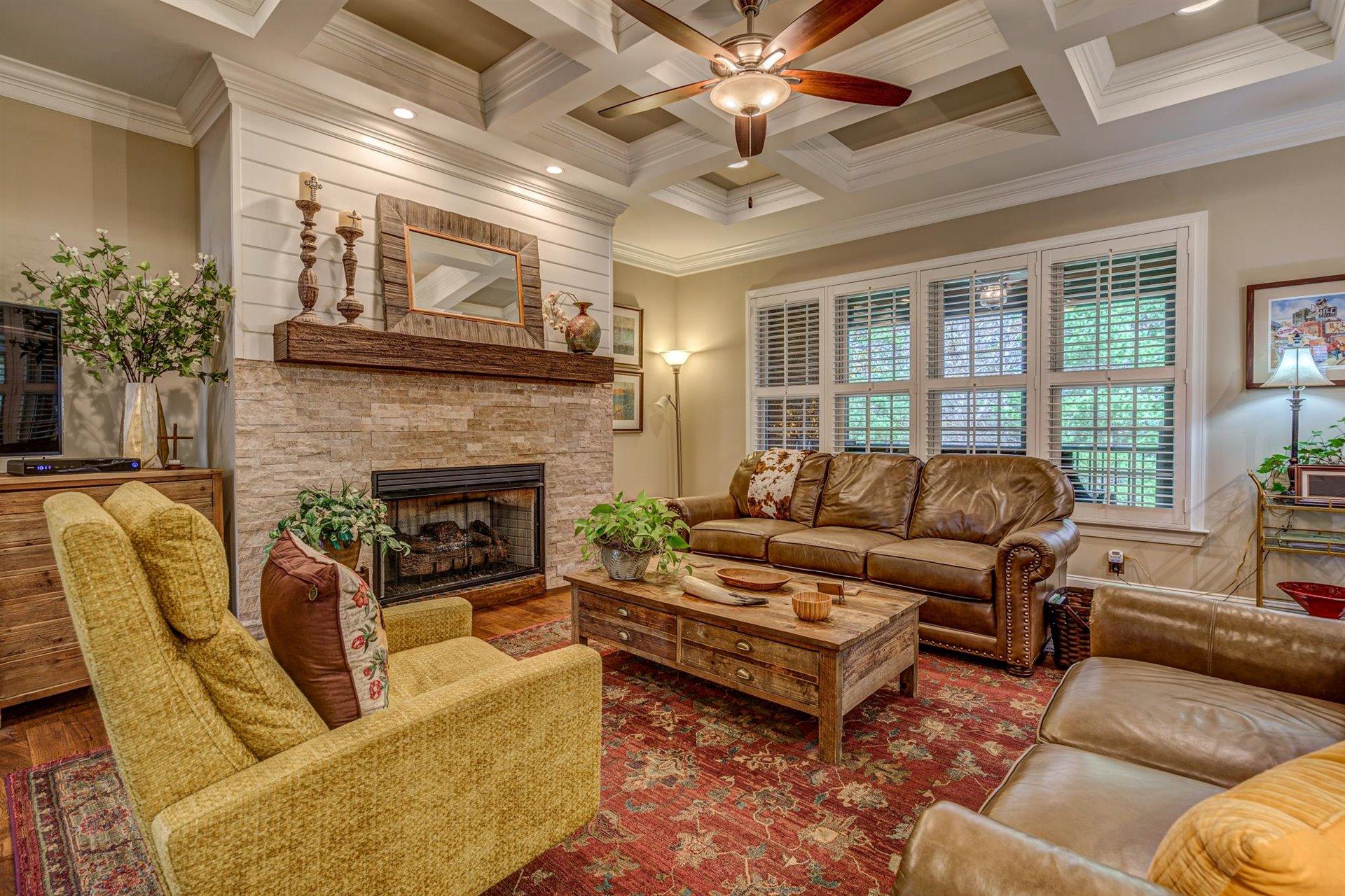6989 Fairway Ridge Road Salem, VA 24153 - Photo 12 of 51 a living room with furniture and a fireplace