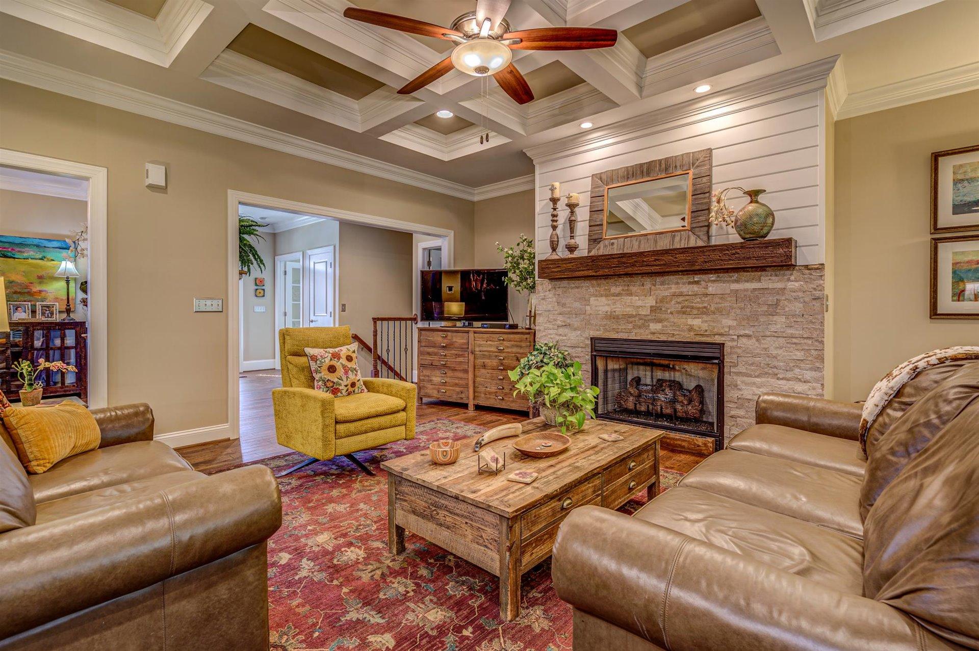 6989 Fairway Ridge Road Salem, VA 24153 - Photo 13 of 51 a living room with furniture and a fireplace