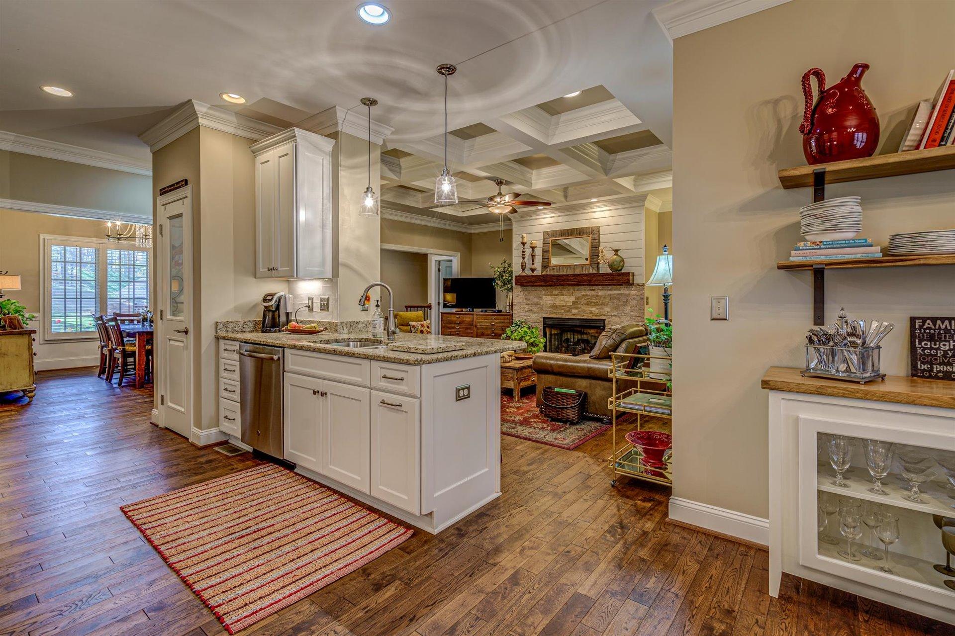 6989 Fairway Ridge Road Salem, VA 24153 - Photo 17 of 51 a kitchen with stove a sink and a refrigerator