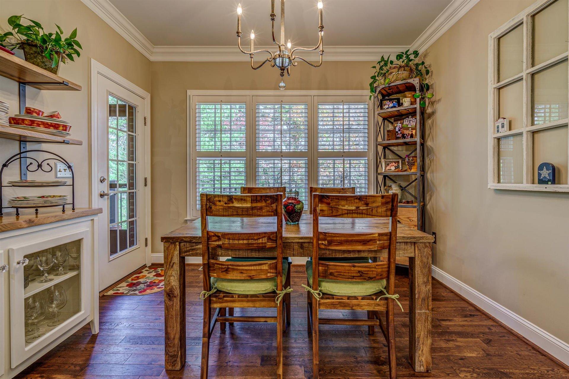 6989 Fairway Ridge Road Salem, VA 24153 - Photo 19 of 51 a view of a dining room with furniture window and wooden floor