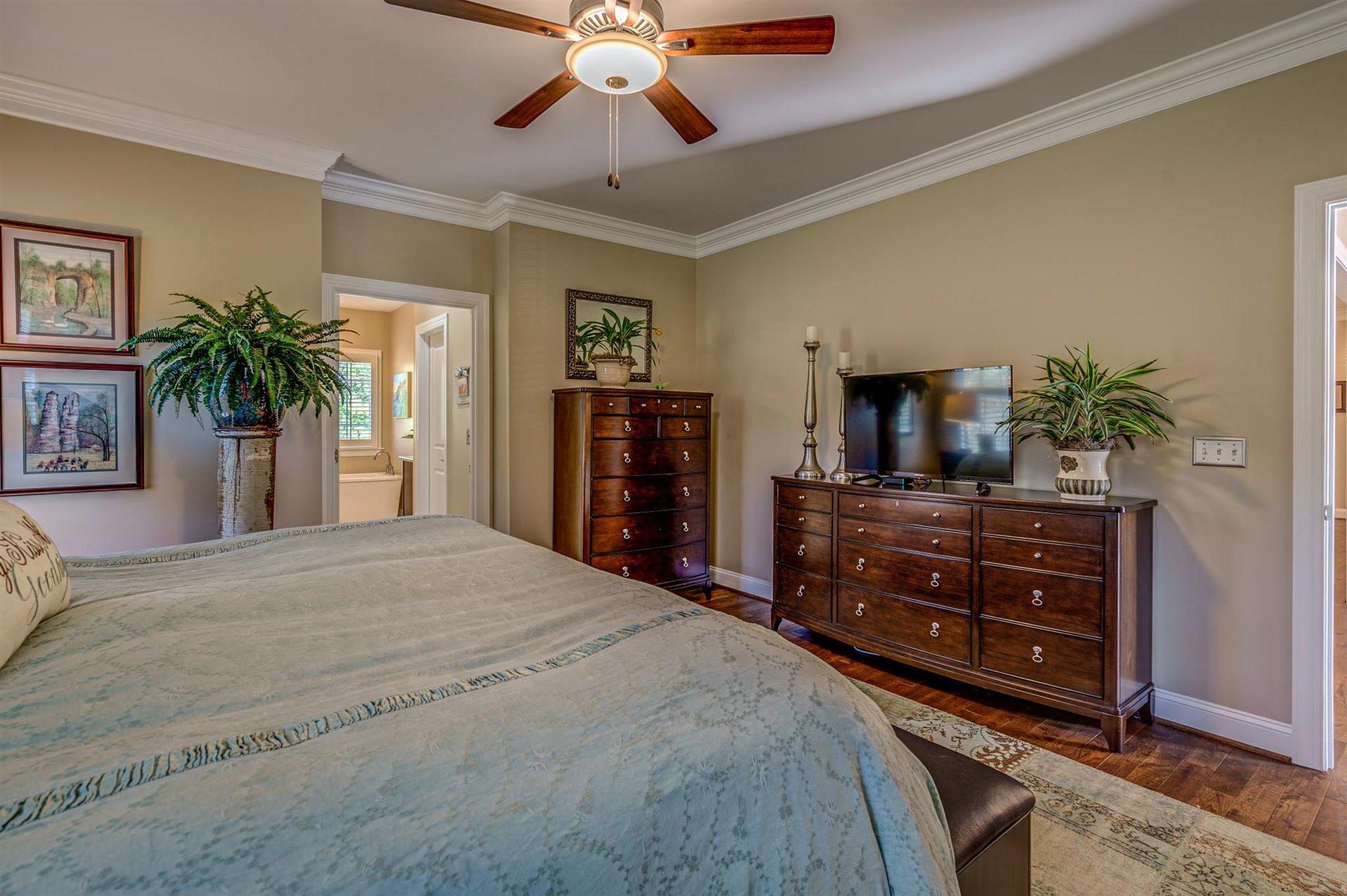 6989 Fairway Ridge Road Salem, VA 24153 - Photo 23 of 51 a bedroom with a bed and a dresser