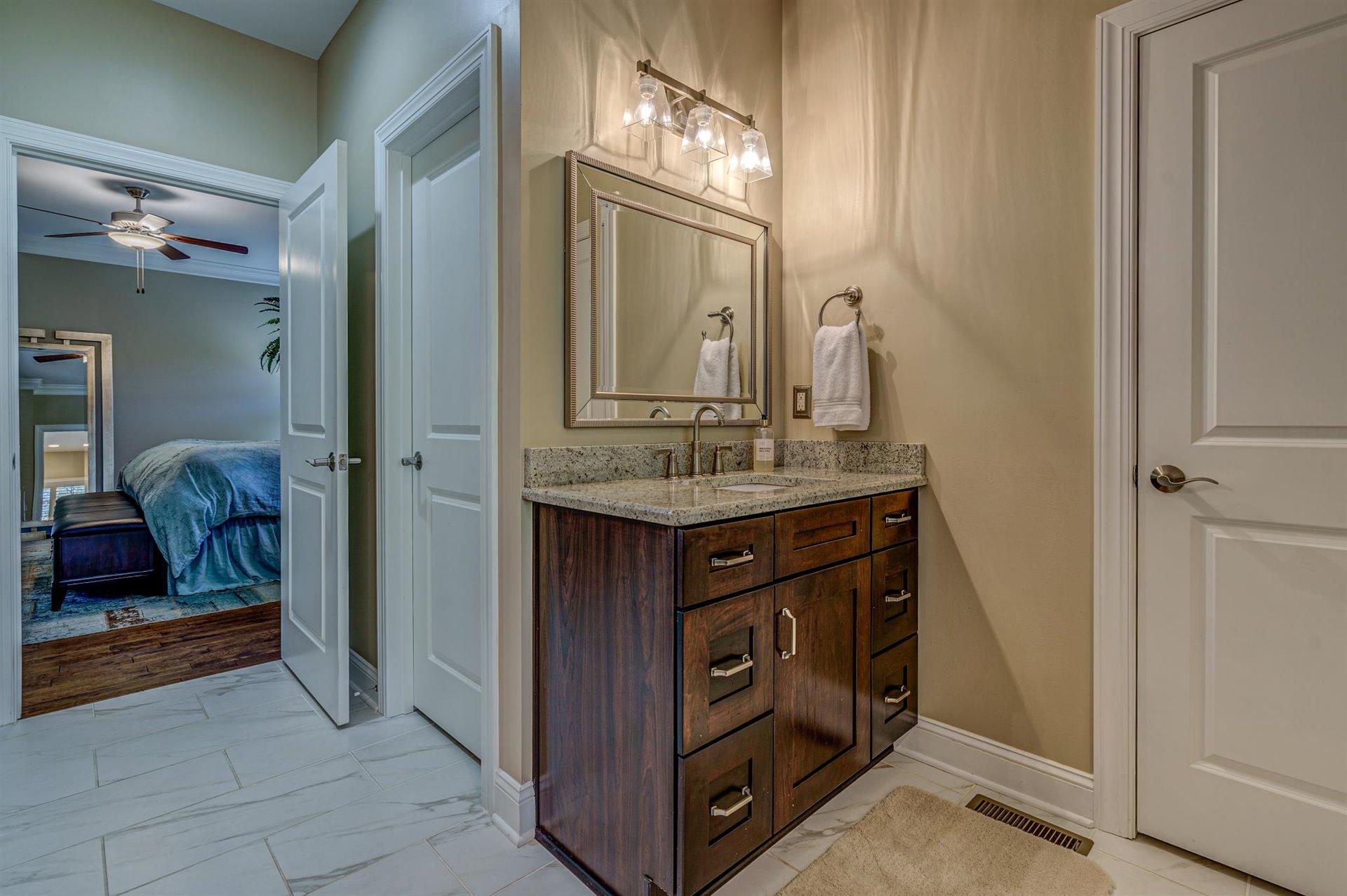 6989 Fairway Ridge Road Salem, VA 24153 - Photo 27 of 51 a bathroom with a sink and a mirror