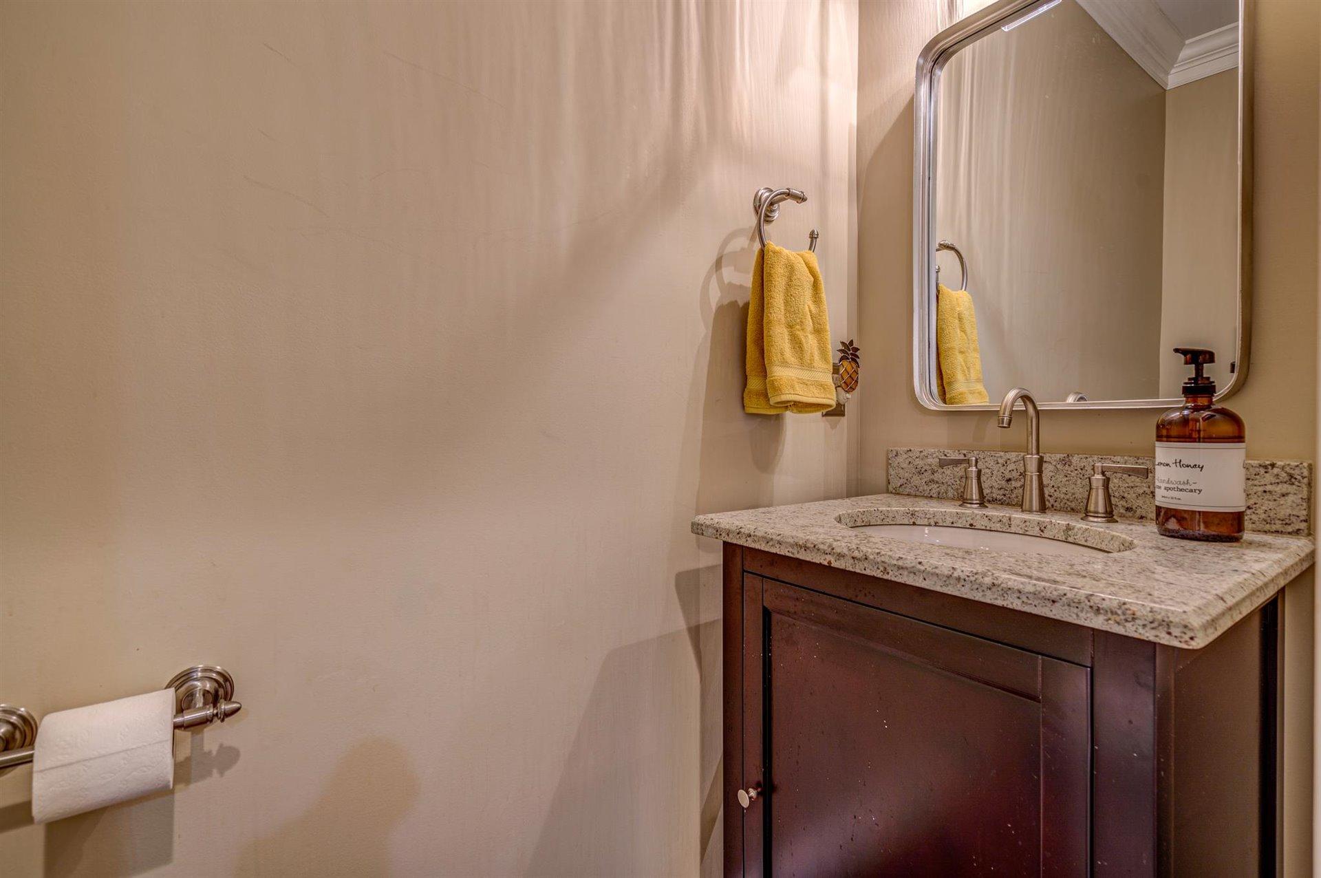 6989 Fairway Ridge Road Salem, VA 24153 - Photo 28 of 51 a bathroom with a granite countertop sink and a mirror