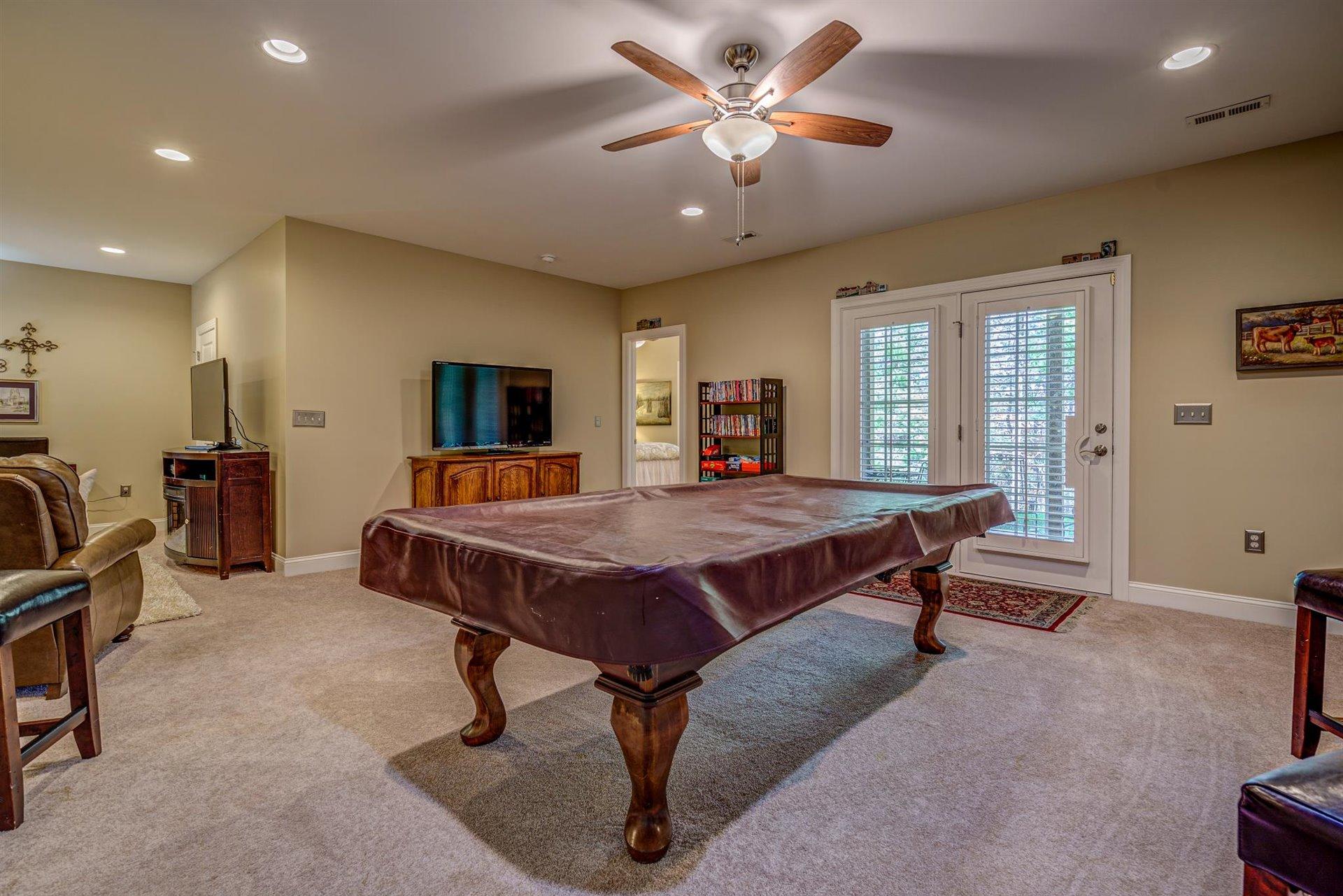 6989 Fairway Ridge Road Salem, VA 24153 - Photo 39 of 51 a living room with furniture pool table and a window