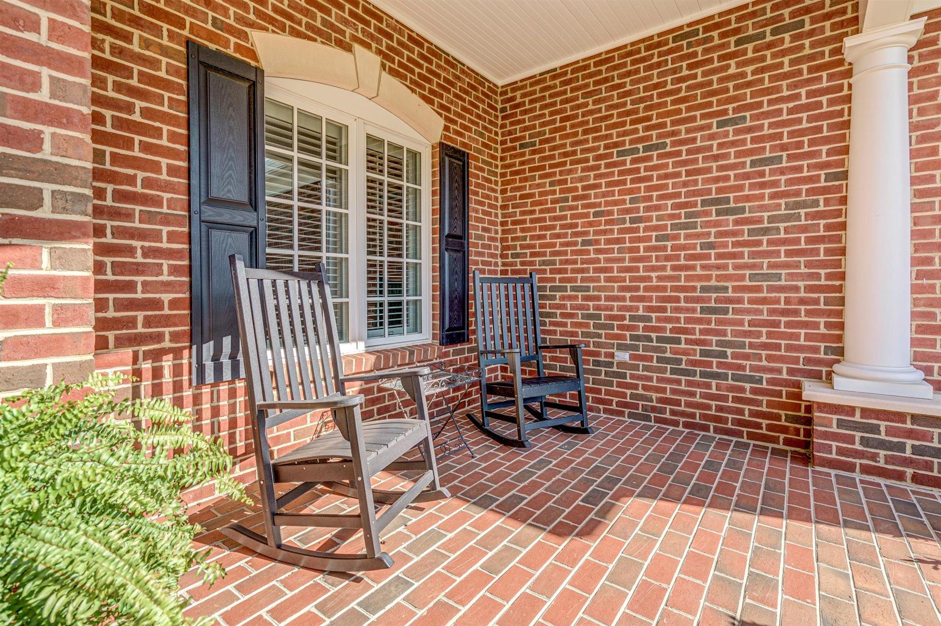 6989 Fairway Ridge Road Salem, VA 24153 - Photo 5 of 51 a view of a patio with a table and chairs