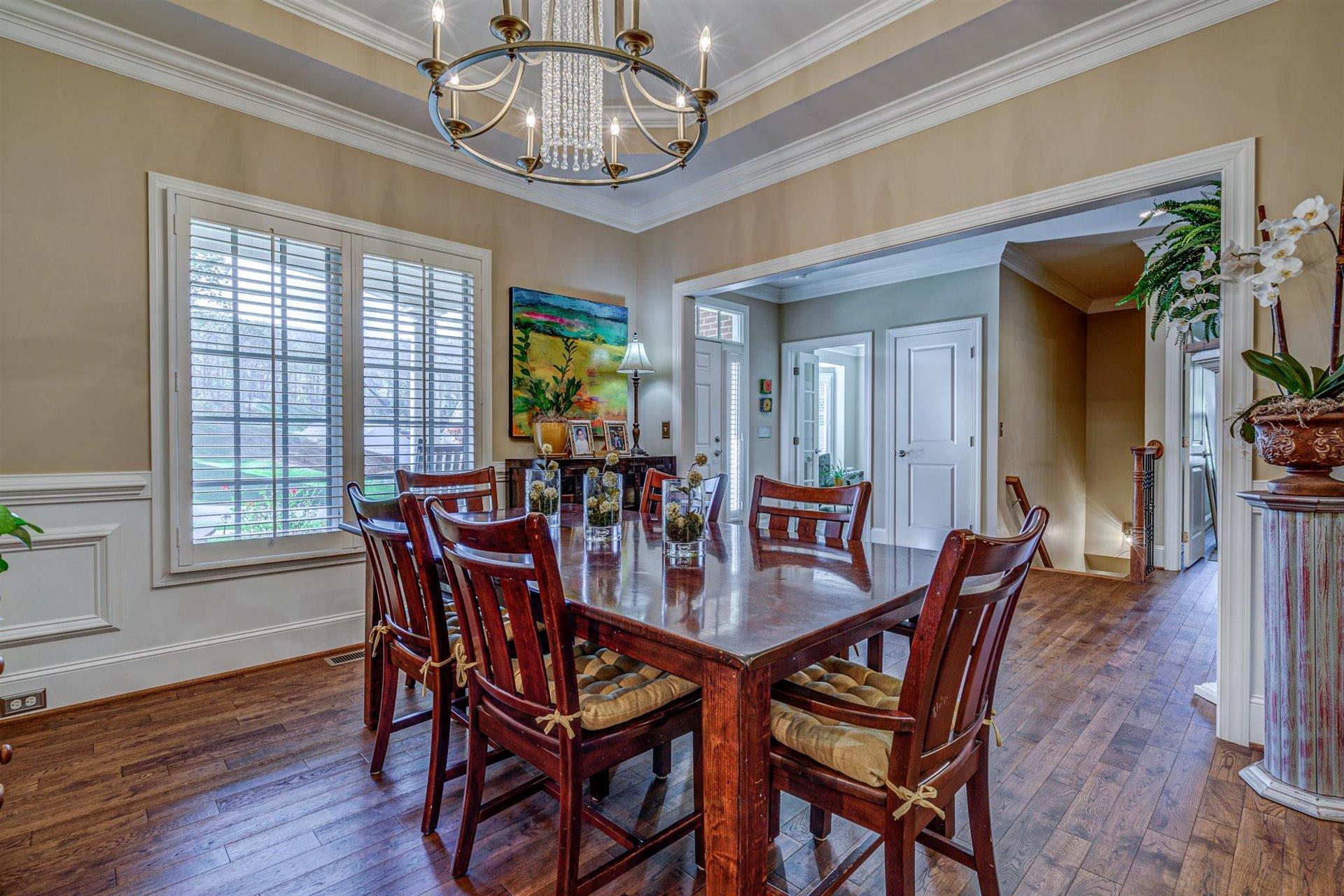 6989 Fairway Ridge Road Salem, VA 24153 - Photo 9 of 51 a view of a dining room with furniture window and wooden floor