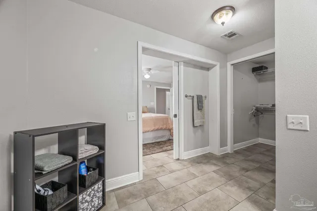 a bathroom with a shower and toilet