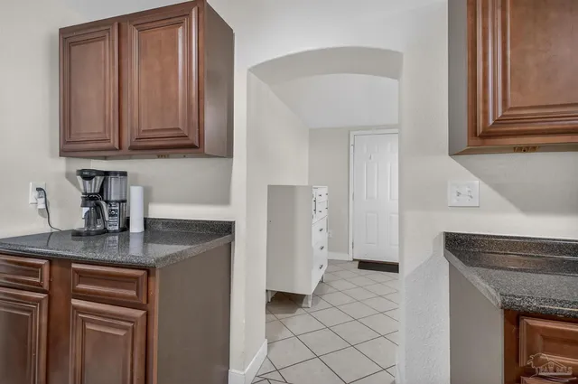 a view of a balcony with wooden floor