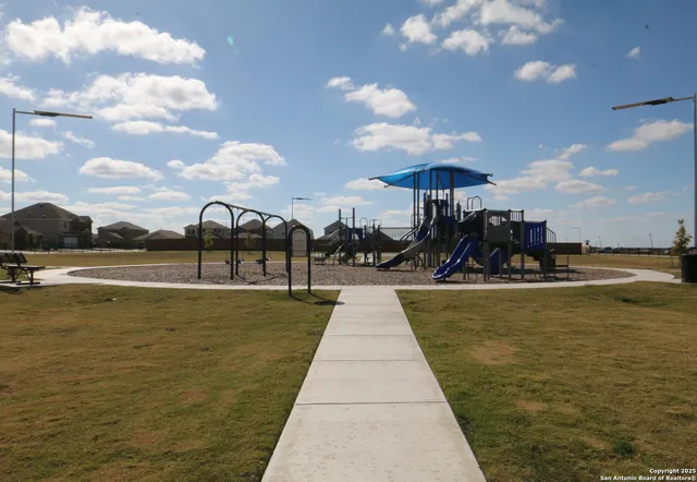 a view of street with parked cars