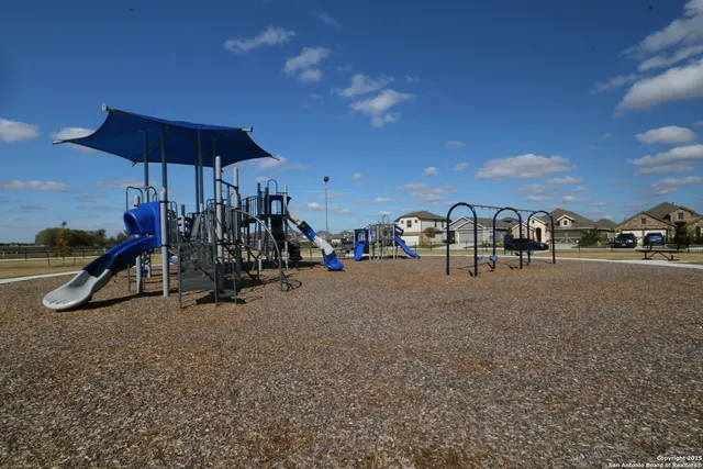 a view of an outdoor space and tennis court