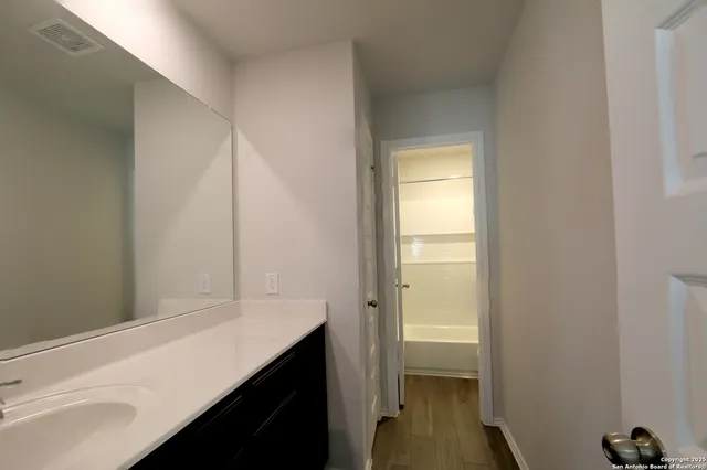 a view of a balcony with furniture