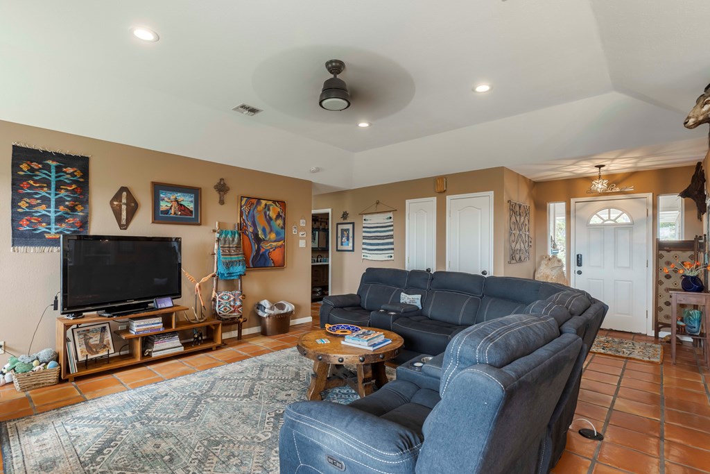 116 Ridge Road West Ingram, TX 78025 - Photo 12 of 65 a living room with furniture and a flat screen tv