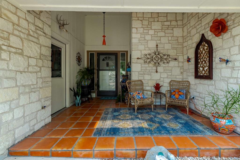 116 Ridge Road West Ingram, TX 78025 - Photo 3 of 65 a backyard of a house with seating space