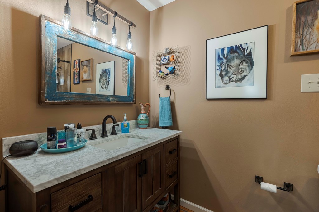 116 Ridge Road West Ingram, TX 78025 - Photo 32 of 65 a bathroom with a sink and a mirror