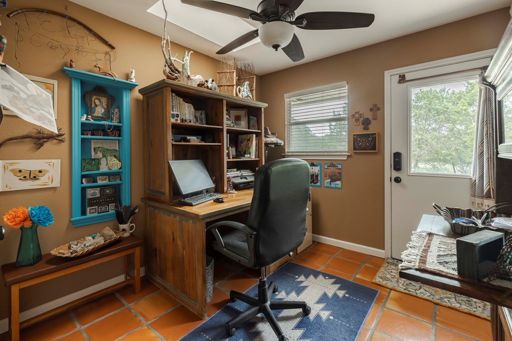 116 Ridge Road West Ingram, TX 78025 - Photo 34 of 65 a view of a workspace with furniture and a window