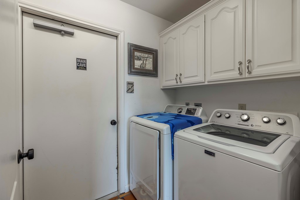 116 Ridge Road West Ingram, TX 78025 - Photo 35 of 65 a utility room with dryer and washer