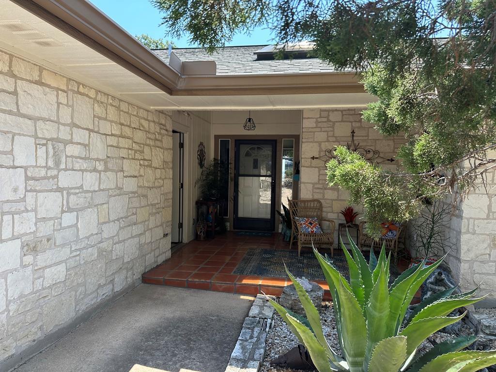 116 Ridge Road West Ingram, TX 78025 - Photo 45 of 65 a view of a potted plants in front of a building