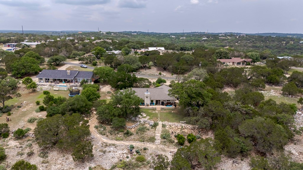 116 Ridge Road West Ingram, TX 78025 - Photo 48 of 65 an aerial view of residential houses with outdoor space and trees