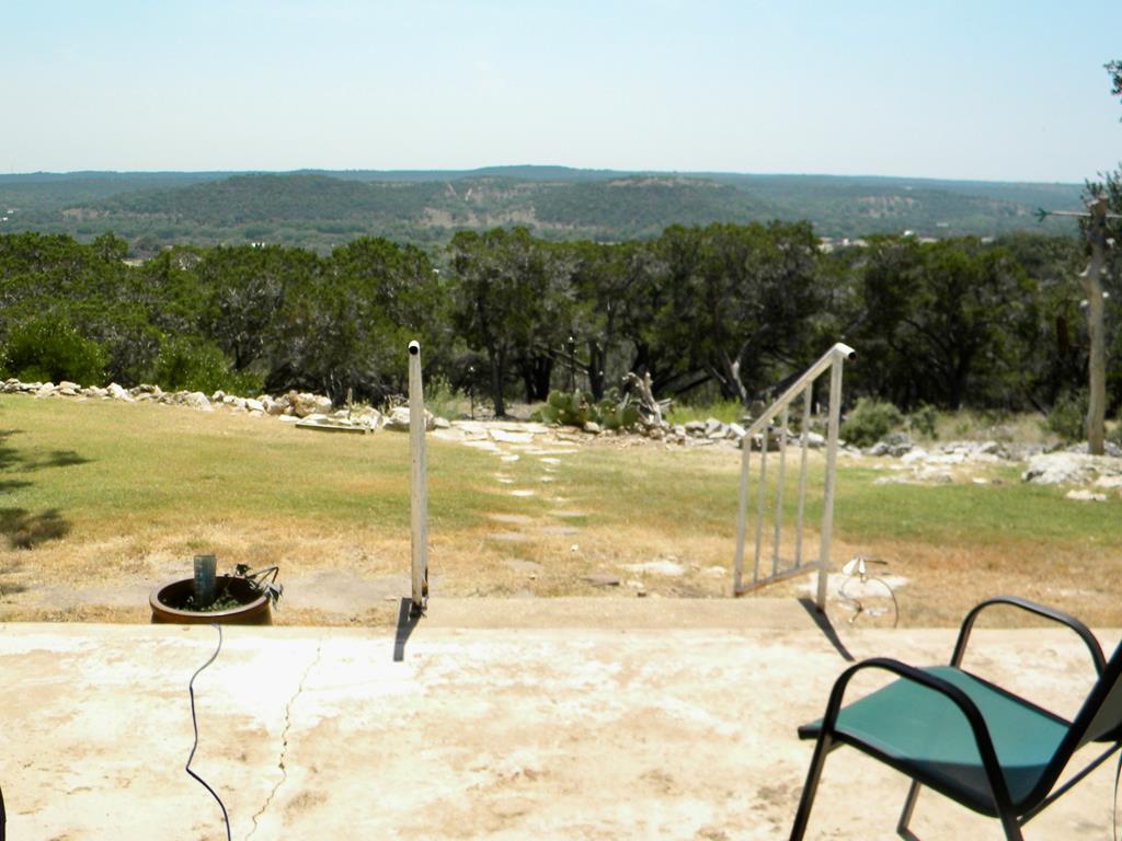 116 Ridge Road West Ingram, TX 78025 - Photo 5 of 65 a view of a lake with a mountain