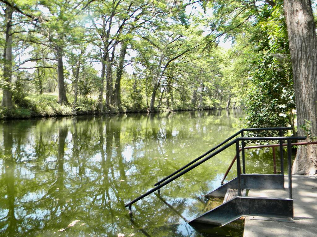 116 Ridge Road West Ingram, TX 78025 - Photo 55 of 65 a view of a lake from a balcony with outdoor space
