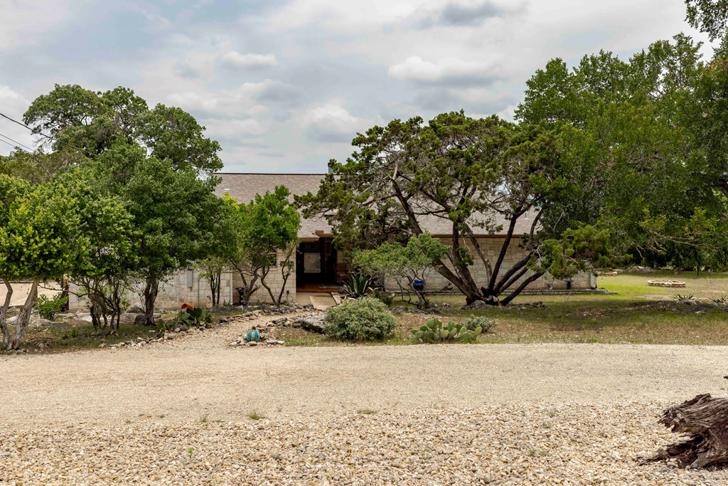 116 Ridge Road West Ingram, TX 78025 - Photo 7 of 65 a view of a yard with an trees