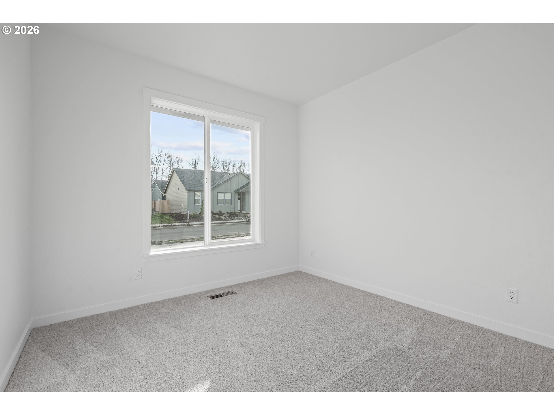 673 Parker Loop Silverton, OR 97381 - Photo 26 of 37 a view of an empty room with a window