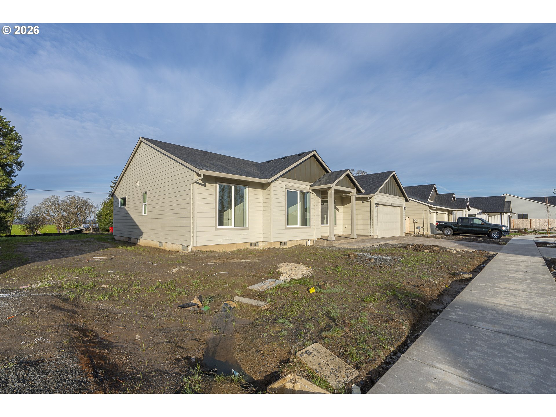673 Parker Loop Silverton, OR 97381 - Photo 3 of 37 a view of house with outdoor space