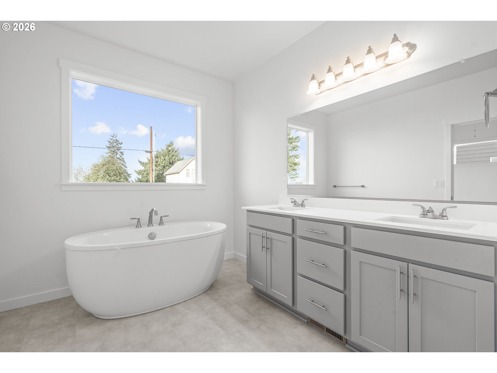 673 Parker Loop Silverton, OR 97381 - Photo 34 of 37 a bathroom with a sink and a bathtub