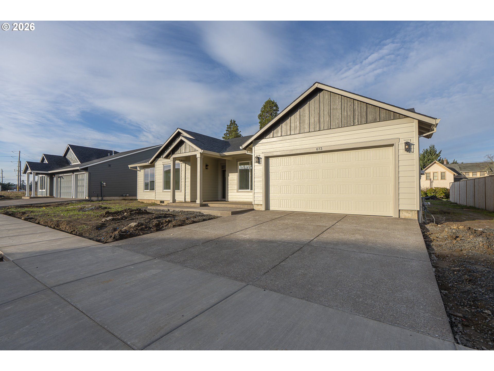 673 Parker Loop Silverton, OR 97381 - Photo 4 of 37 a view of front of house with garage