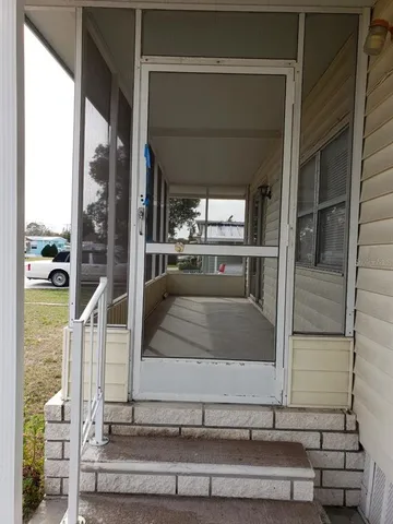 a living room with fireplace