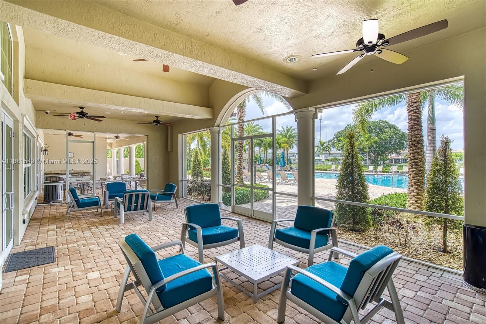 5060 Eucalyptus Drive, Unit 2 Hollywood, FL 33021 - Photo 20 of 43 a living room with furniture and a large window