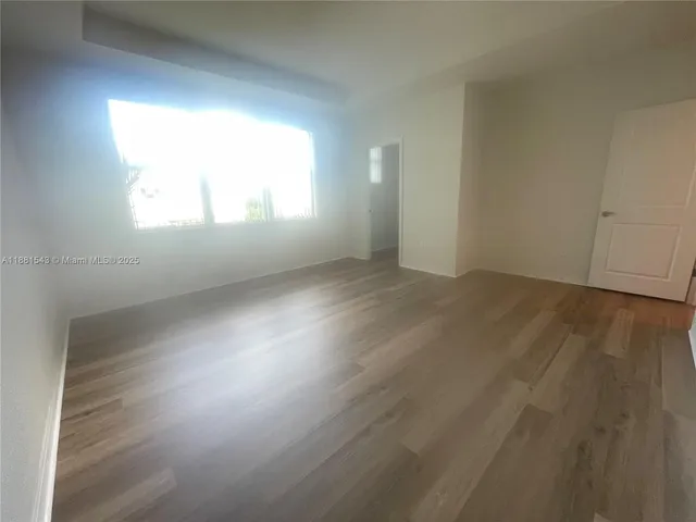 a view of hallway with closet