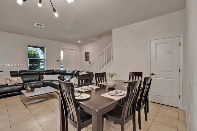 a view of a dining room with furniture
