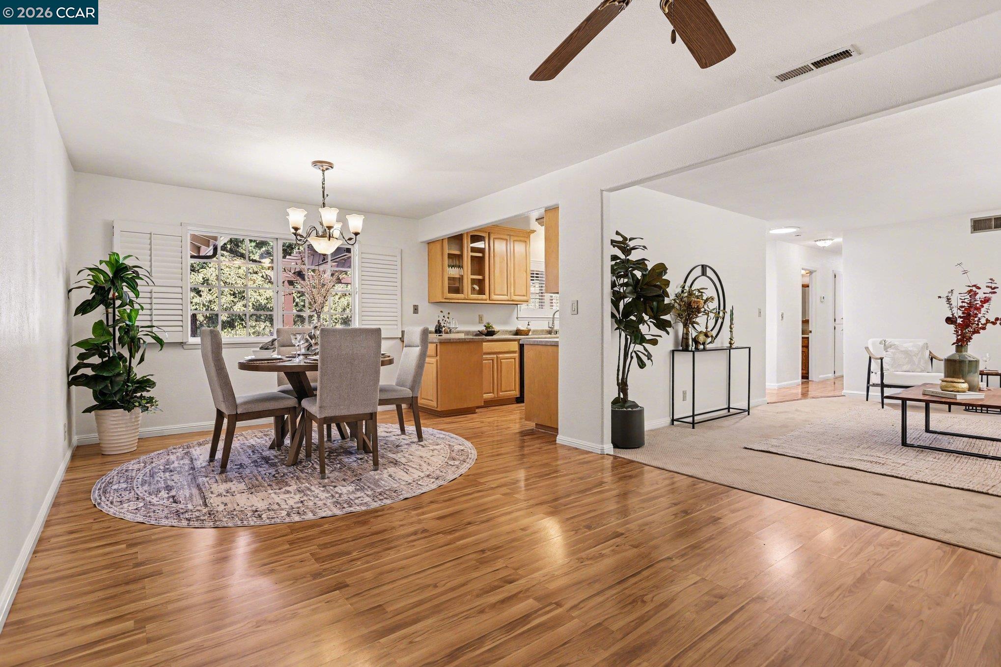 1451 Franklin Canyon Road Martinez, CA 94553 - Photo 12 of 45 a living room with furniture and a chandelier