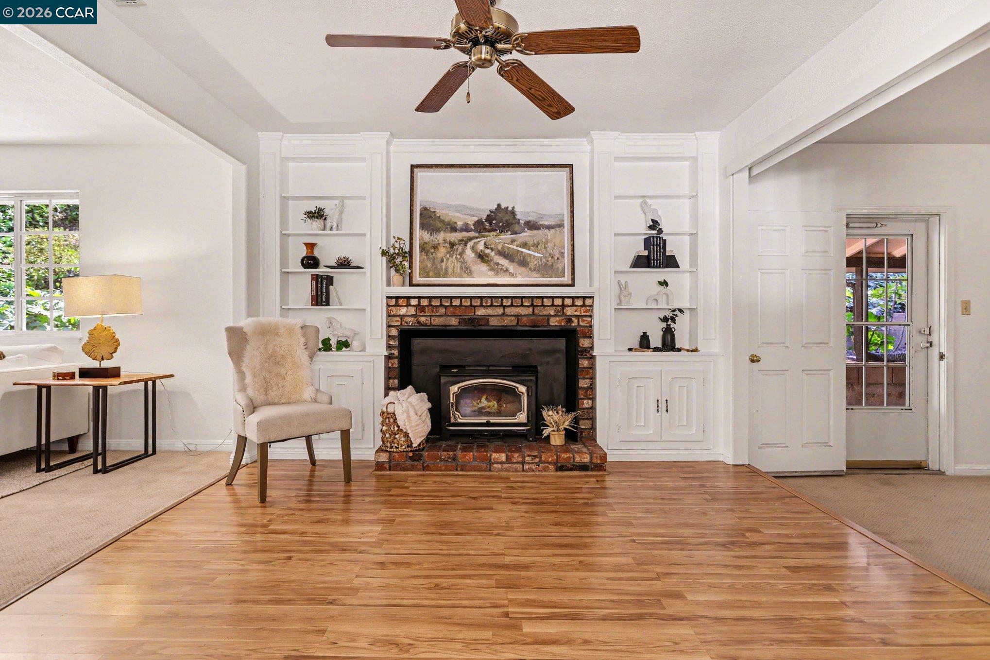 1451 Franklin Canyon Road Martinez, CA 94553 - Photo 13 of 45 a living room with furniture and a fireplace