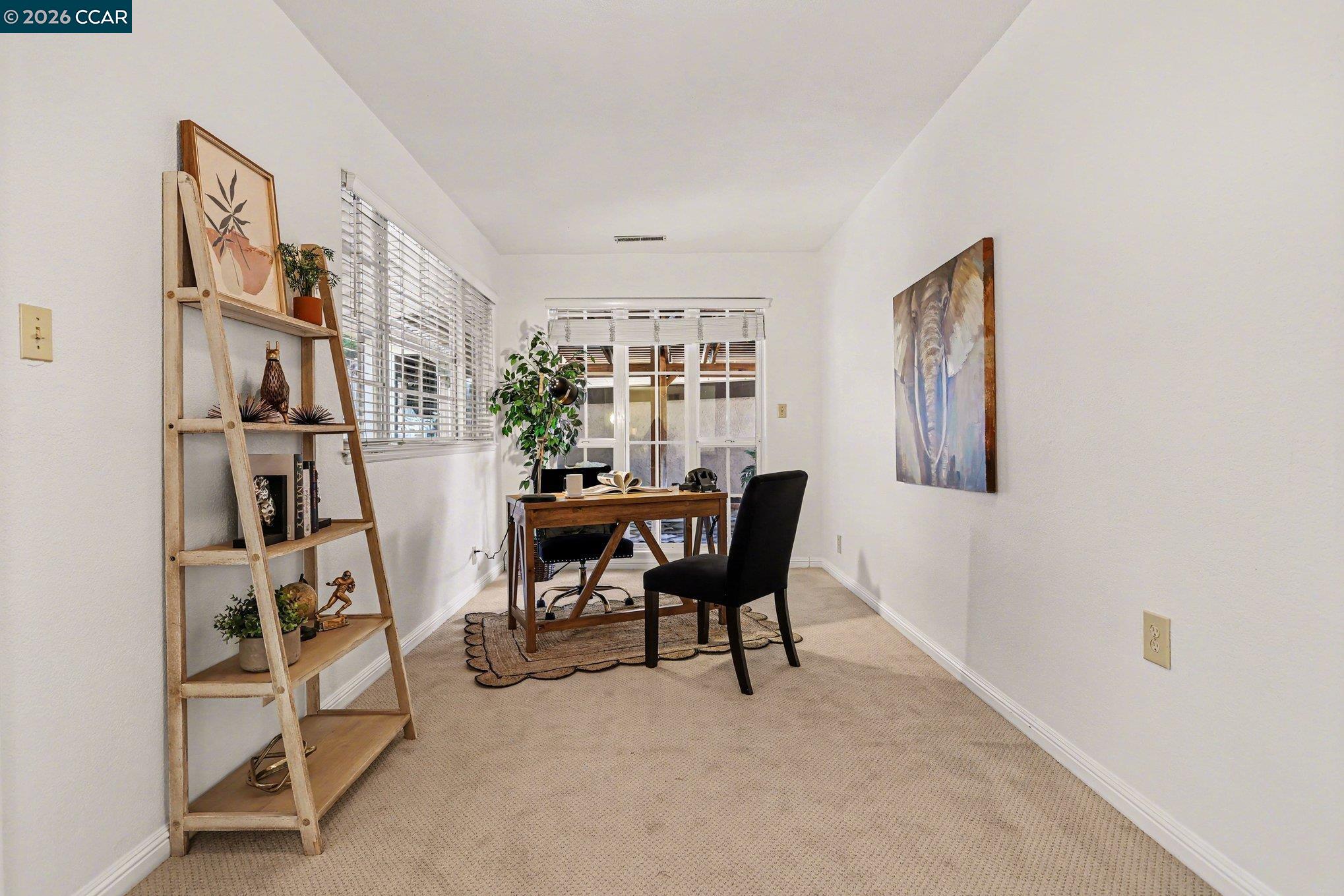 1451 Franklin Canyon Road Martinez, CA 94553 - Photo 14 of 45 a view of a workspace with furniture and a window