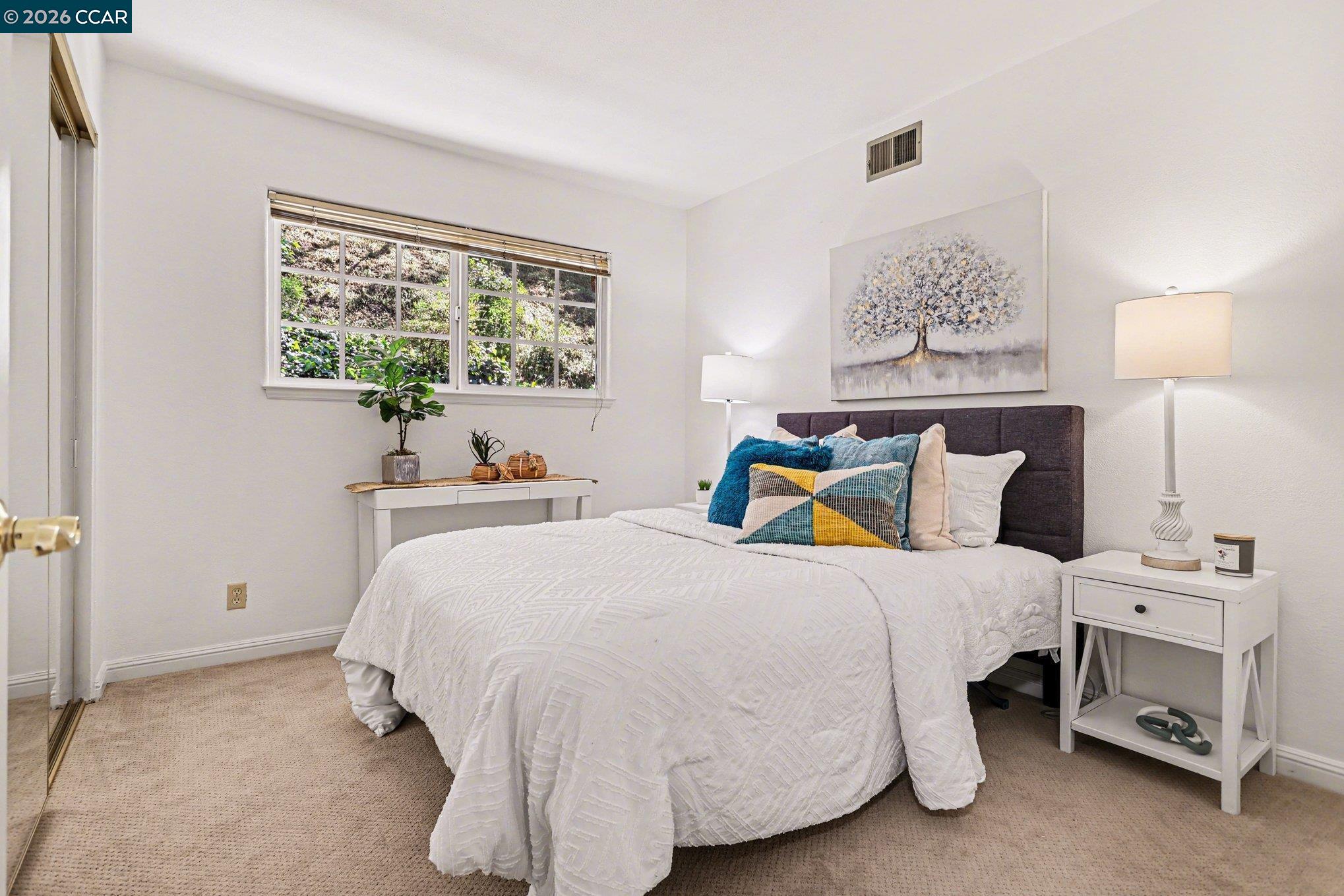 1451 Franklin Canyon Road Martinez, CA 94553 - Photo 21 of 45 a bedroom with a bed and a window