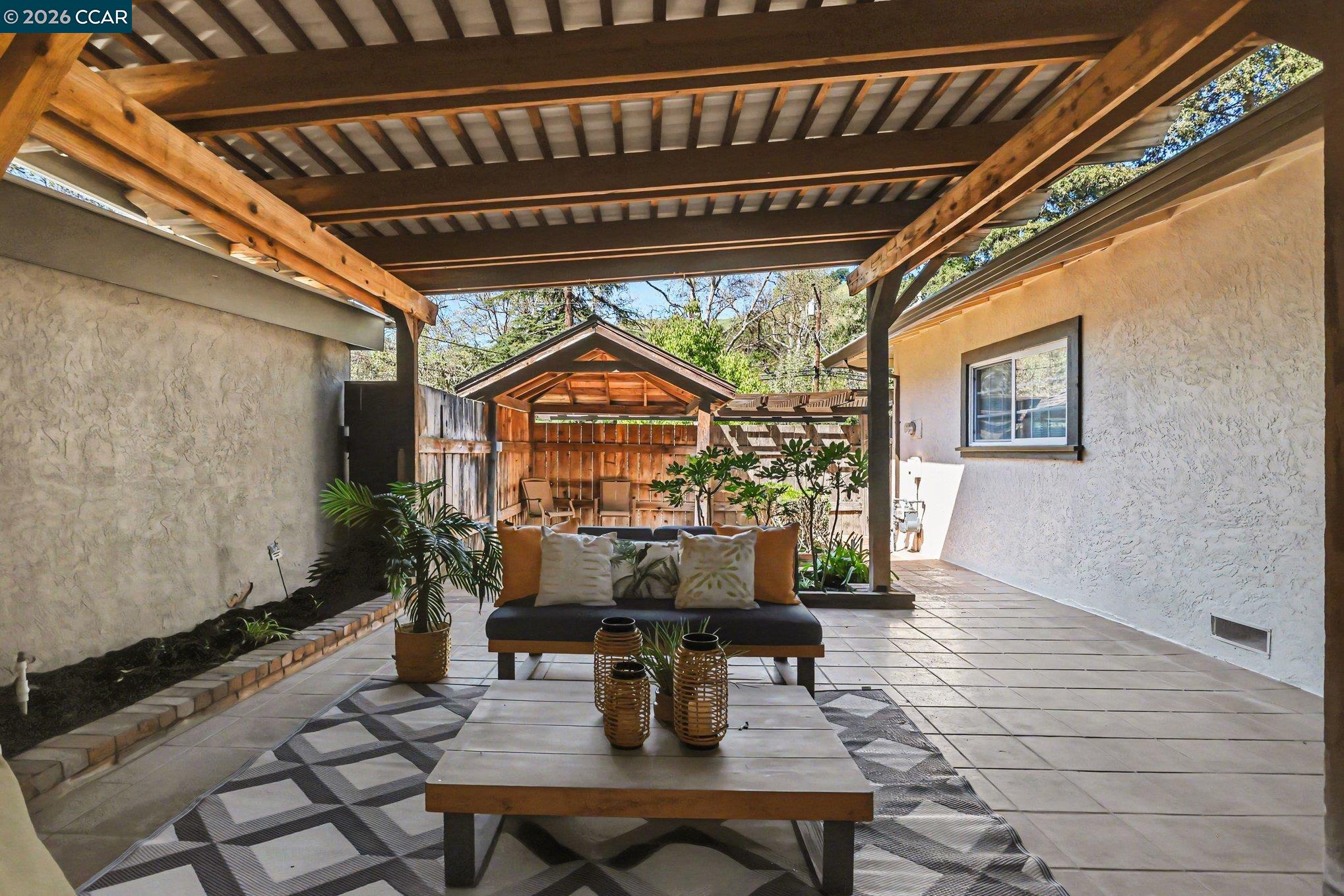 1451 Franklin Canyon Road Martinez, CA 94553 - Photo 24 of 45 a outdoor living space with furniture and a potted plant
