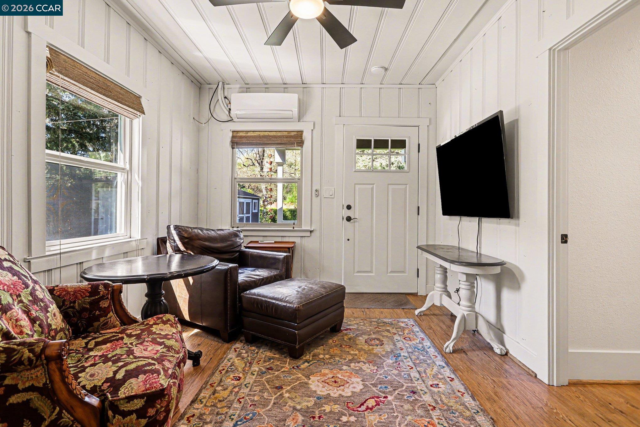 1451 Franklin Canyon Road Martinez, CA 94553 - Photo 29 of 45 a living room with furniture and a flat screen tv