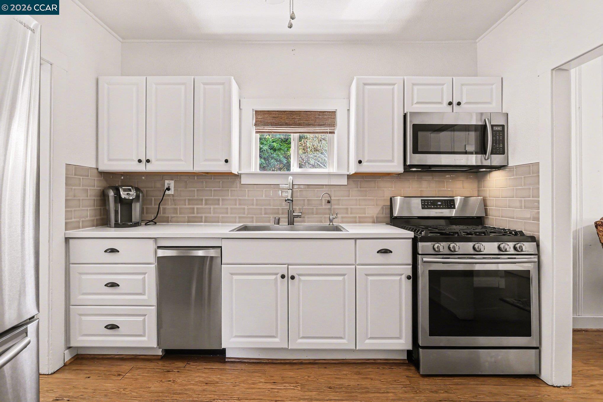 1451 Franklin Canyon Road Martinez, CA 94553 - Photo 31 of 45 a kitchen with stainless steel appliances granite countertop a stove and a sink