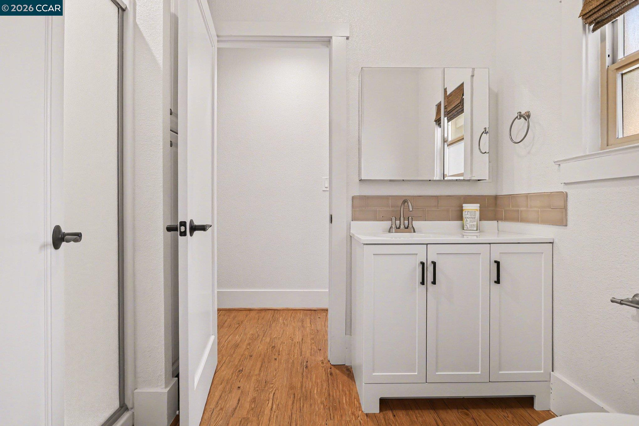 1451 Franklin Canyon Road Martinez, CA 94553 - Photo 35 of 45 a bathroom with a sink and a mirror