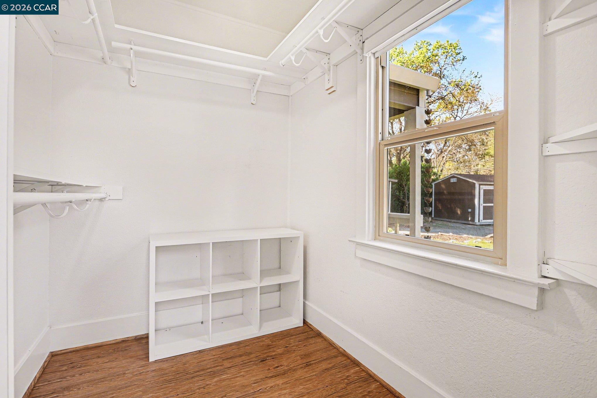 1451 Franklin Canyon Road Martinez, CA 94553 - Photo 36 of 45 a view of a room with wooden floor and windows