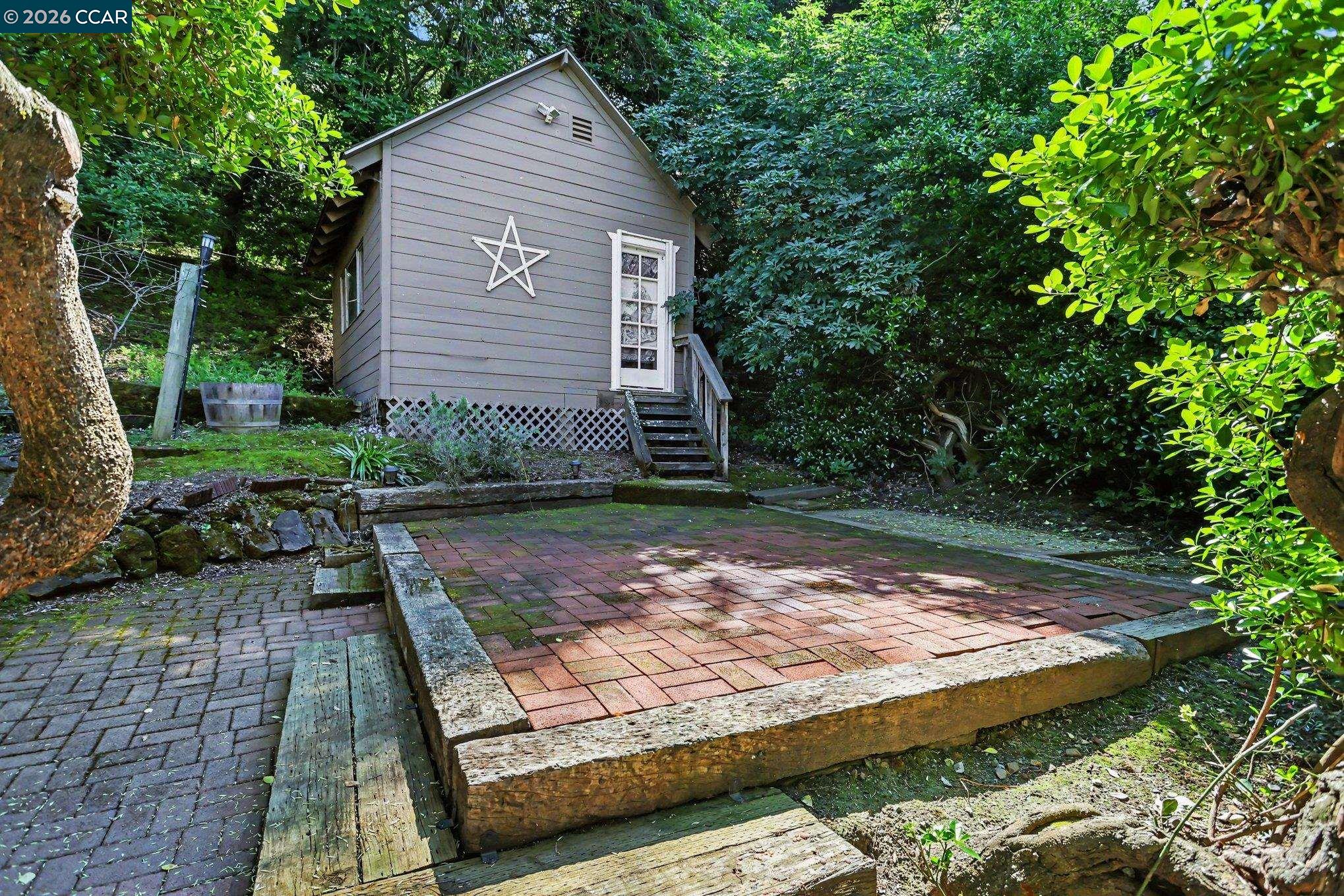 1451 Franklin Canyon Road Martinez, CA 94553 - Photo 39 of 45 a view of a backyard with a garden