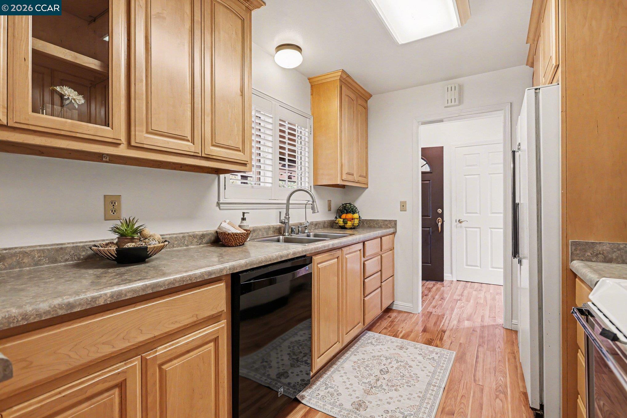 1451 Franklin Canyon Road Martinez, CA 94553 - Photo 6 of 45 a kitchen with stainless steel appliances granite countertop a sink stove and refrigerator